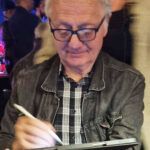 Caricaturist Drawing caricatures in London on iPad