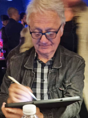 Caricaturist Drawing caricatures on iPad in London Caricaturist Drawing caricatures on iPad in London
